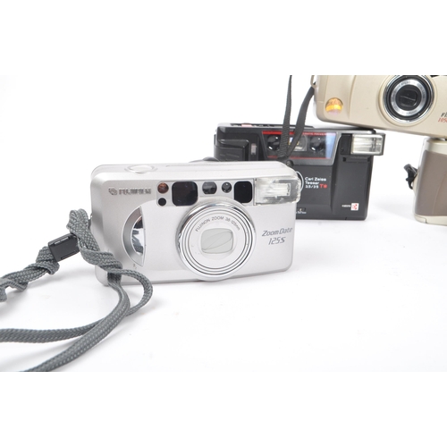 271 - A collection of late 20th century 35mm and other compact film point and shoot cameras. The collectio... 