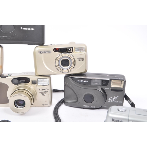 271 - A collection of late 20th century 35mm and other compact film point and shoot cameras. The collectio... 