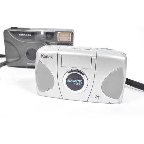 271 - A collection of late 20th century 35mm and other compact film point and shoot cameras. The collectio... 