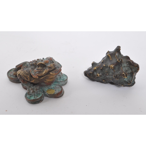 280 - A collection of 20th century Chinese bronze and brass curios. The collection to include a small cloi... 