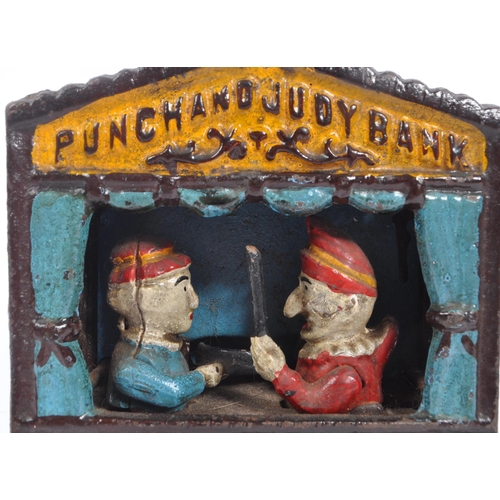 281 - Punch and Judy - An early 20th Century cast iron novelty mechanical Punch and Judy Bank money box se... 