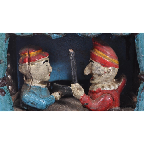 281 - Punch and Judy - An early 20th Century cast iron novelty mechanical Punch and Judy Bank money box se... 