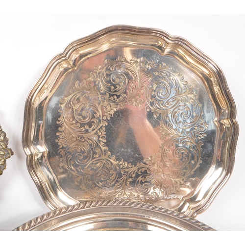 282 - A collection of 19th Century and later silver plated items to include two small raised trays, a lidd... 