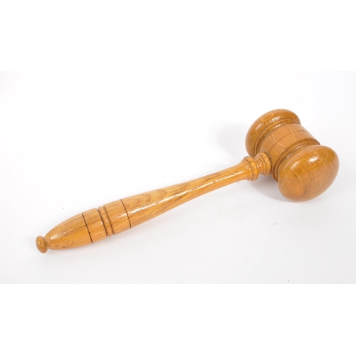 285 - A collection of wooden items to include a black forest candle holder in the form of a dog's head wit... 