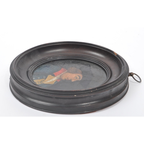 286 - A 19th century miniature portrait painting. The painting in oval mahogany frame, depicting a man in ... 