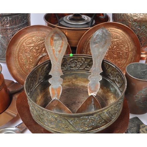 287 - A collection of 20th Century copper items / curios. The collection to include two small stove burner... 