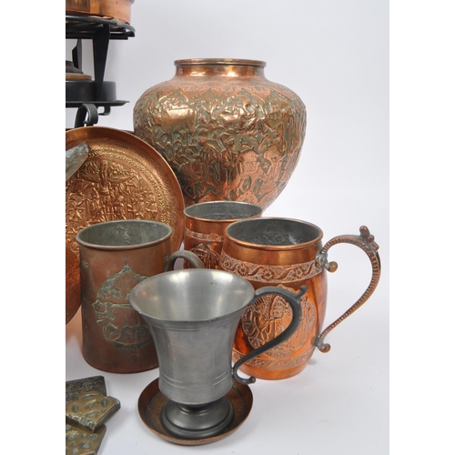 287 - A collection of 20th Century copper items / curios. The collection to include two small stove burner... 