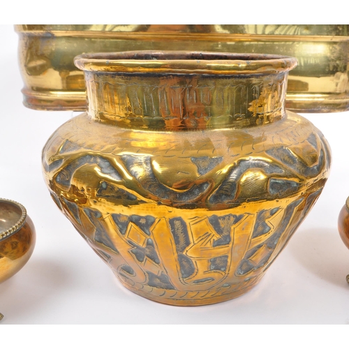 288 - A late 19th Century Victorian brass planter of ovoid form with twin handles to either side with roun... 