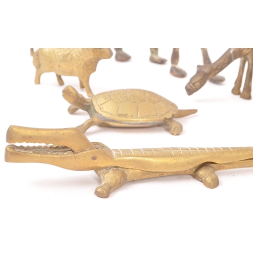 290 - A collection of 19th Century and later small brass animal items / curios. To include a crocodile nut... 