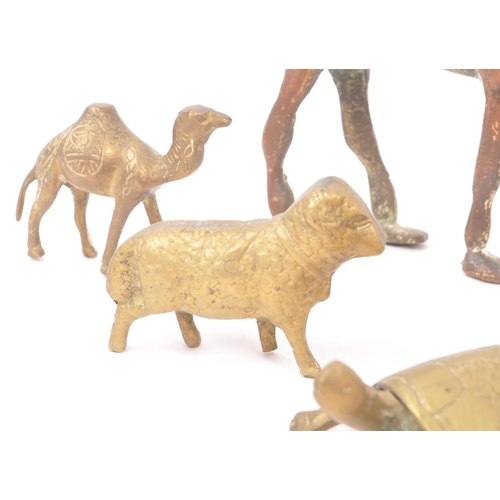 290 - A collection of 19th Century and later small brass animal items / curios. To include a crocodile nut... 