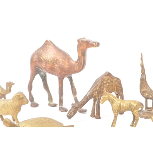 290 - A collection of 19th Century and later small brass animal items / curios. To include a crocodile nut... 