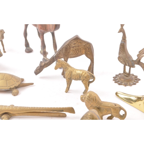 290 - A collection of 19th Century and later small brass animal items / curios. To include a crocodile nut... 