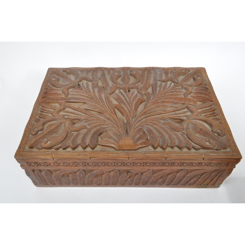 294 - Two 20th Century Chinese wooden jewellery / sewing boxes, one of rectangular form with carved relief... 