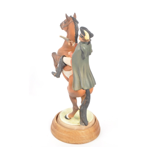 3 - Beswick - Highwayman - A porcelain hand painted china statue of a man figure on a rearing horse. On ... 