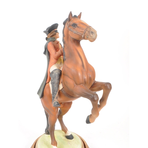 3 - Beswick - Highwayman - A porcelain hand painted china statue of a man figure on a rearing horse. On ... 