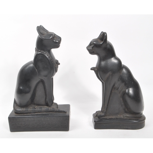 331 - A pair of 20th Century heavy black resin Egyptian Bastet ' sphynx ' cat figurines in seated position... 