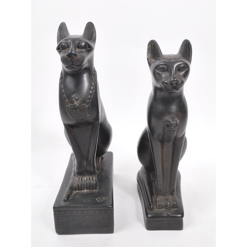 331 - A pair of 20th Century heavy black resin Egyptian Bastet ' sphynx ' cat figurines in seated position... 