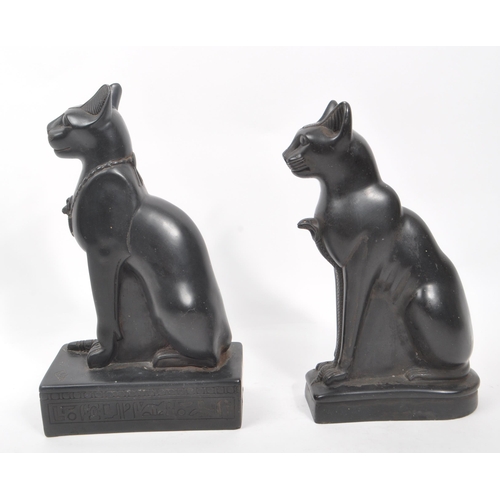 331 - A pair of 20th Century heavy black resin Egyptian Bastet ' sphynx ' cat figurines in seated position... 