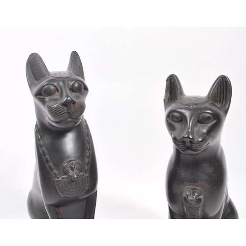 331 - A pair of 20th Century heavy black resin Egyptian Bastet ' sphynx ' cat figurines in seated position... 