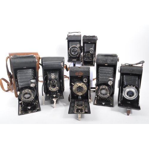 336 - A collection of early and mid 20th century folding cameras. The collection to include examples such ... 