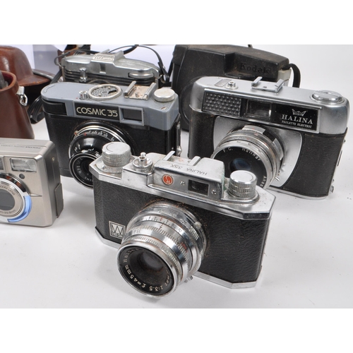 338 - A large collection of 20th century and contemporary cameras. The collection to include both film and... 