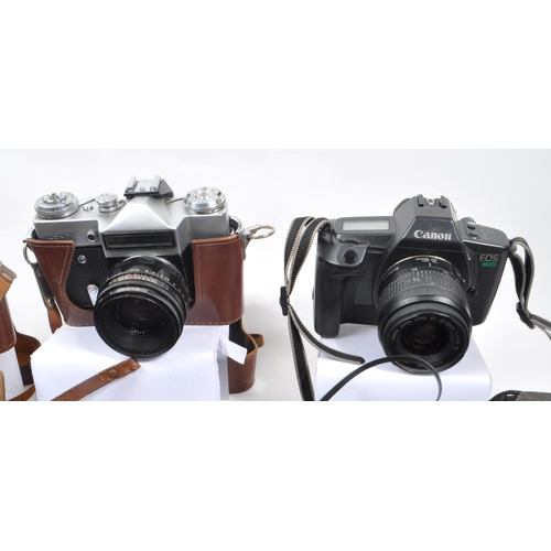 338 - A large collection of 20th century and contemporary cameras. The collection to include both film and... 