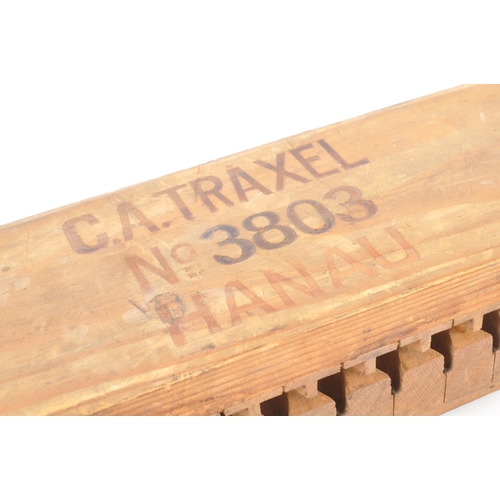 339 - An early 20th century wooden cigar mould. The mould mark to top ' C. A. Travel No. 3803 Hanau '. For... 