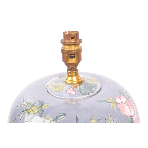 35 - An early 20th century Chinese converted urn vase table lamp. The lamp of urn form, raised on a later... 