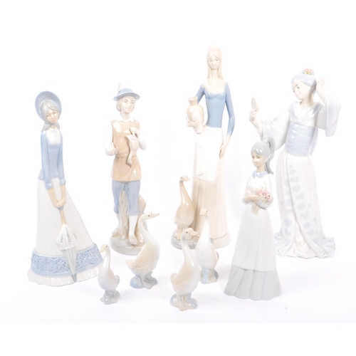 38 - M Requenas - A collection of 20th century M Requenas Spanish porcelain figures. The collection to in... 