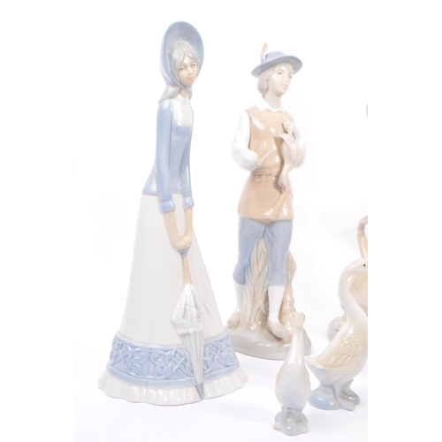 38 - M Requenas - A collection of 20th century M Requenas Spanish porcelain figures. The collection to in... 