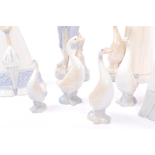 38 - M Requenas - A collection of 20th century M Requenas Spanish porcelain figures. The collection to in... 