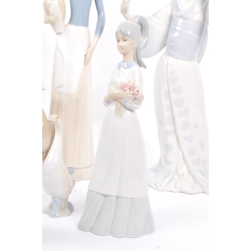 38 - M Requenas - A collection of 20th century M Requenas Spanish porcelain figures. The collection to in... 