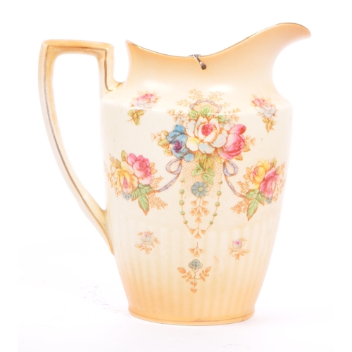 44 - S. F. & CO. - A late 19th century S. F. & Co. Crown Devon jug, alongside a small Jardinière planter ... 