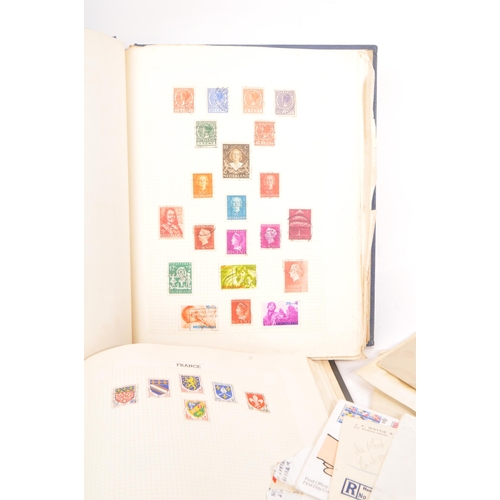 443 - Stamps - a vintage all-world stamp collection spanning two albums, and other philatelic material inc... 