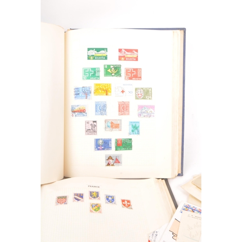 443 - Stamps - a vintage all-world stamp collection spanning two albums, and other philatelic material inc... 