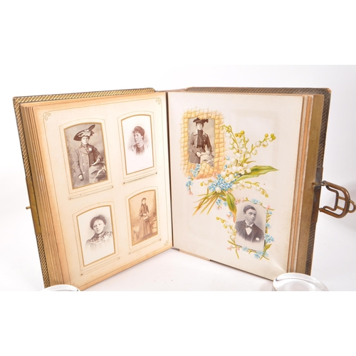 446 - A 19th Century Victorian leather bound musical photo album containing portrait photographs and carte... 