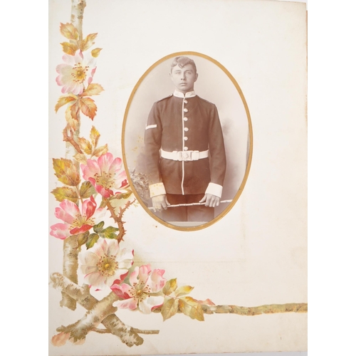 446 - A 19th Century Victorian leather bound musical photo album containing portrait photographs and carte... 