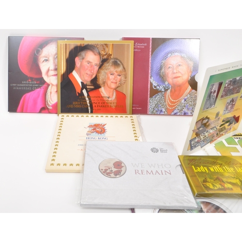 449 - Royal Mint - A collection of Royal Mint commemorative coin packs comprising of Queen Elizabeth the Q... 