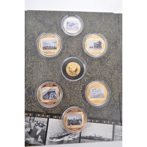 464 - London Mint - A 1939-1945 Road To Victory commemorative coin / medal pack. The collection including ... 