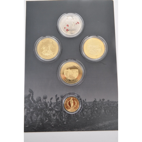 466 - London Mint - A War To End All Wars commemorative coin / medal pack. The collection including four g... 