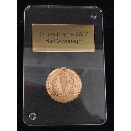 480 - A 2017 Gibraltar issued Gold Remembrance Half Sovereign coin. The coin in slab. With original packag... 