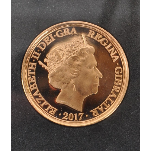 480 - A 2017 Gibraltar issued Gold Remembrance Half Sovereign coin. The coin in slab. With original packag... 