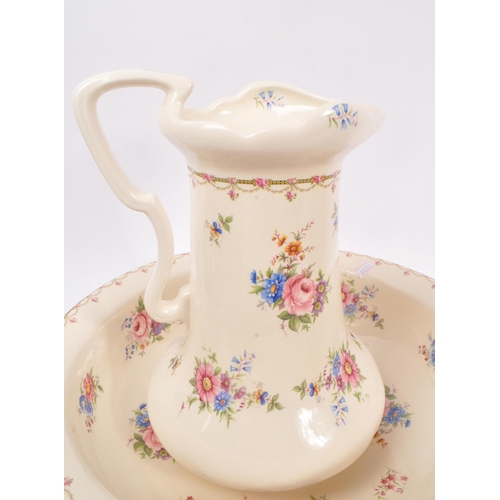 49 - S. F. & Co. - An early 20th century S. F. & Co. Crown Devon chamber pot, alongside Ironstone washing... 