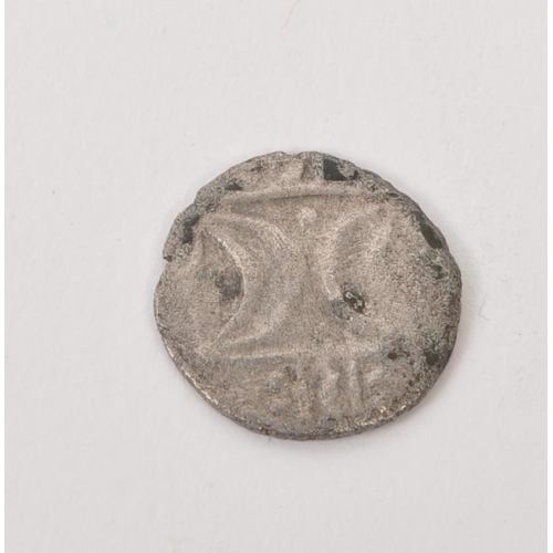 490 - An Iron Age circa AD 10-45 British Iceni tribe silver coin. The coin featuring horse to obverse, wit... 