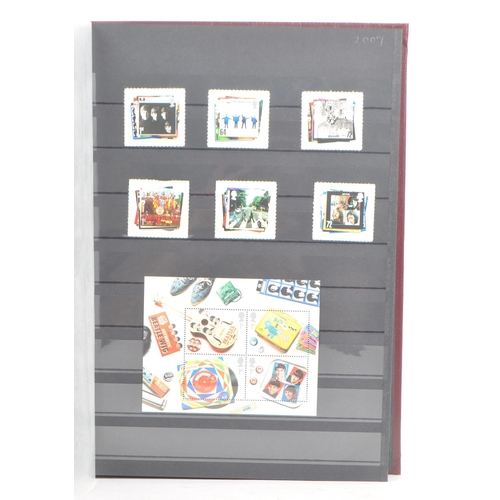 496 - Royal Mail - A collection of British Royal Mail commemorative stamps held unhinged within a stamp al... 
