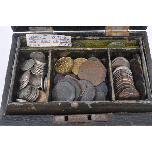 498 - A collection of James I and later British currency coins, alongside some Roman examples. The collect... 