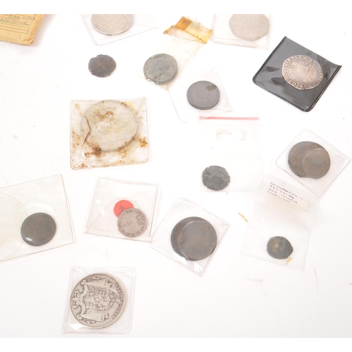 498 - A collection of James I and later British currency coins, alongside some Roman examples. The collect... 