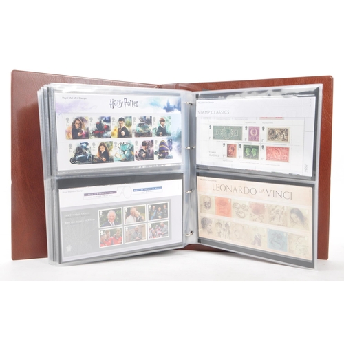 504 - Royal Mail - A large collection of British Royal Mail commemorative stamps presentation packs held w... 