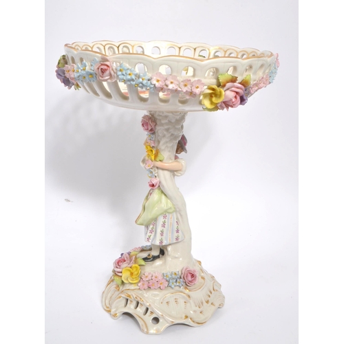 51 - Plaue Schierholz - An early 20th Century German porcelain compote / centrepiece having round basket ... 