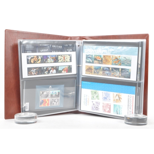 513 - Royal Mail - A large collection of British Royal Mail commemorative stamps presentation packs. The c... 